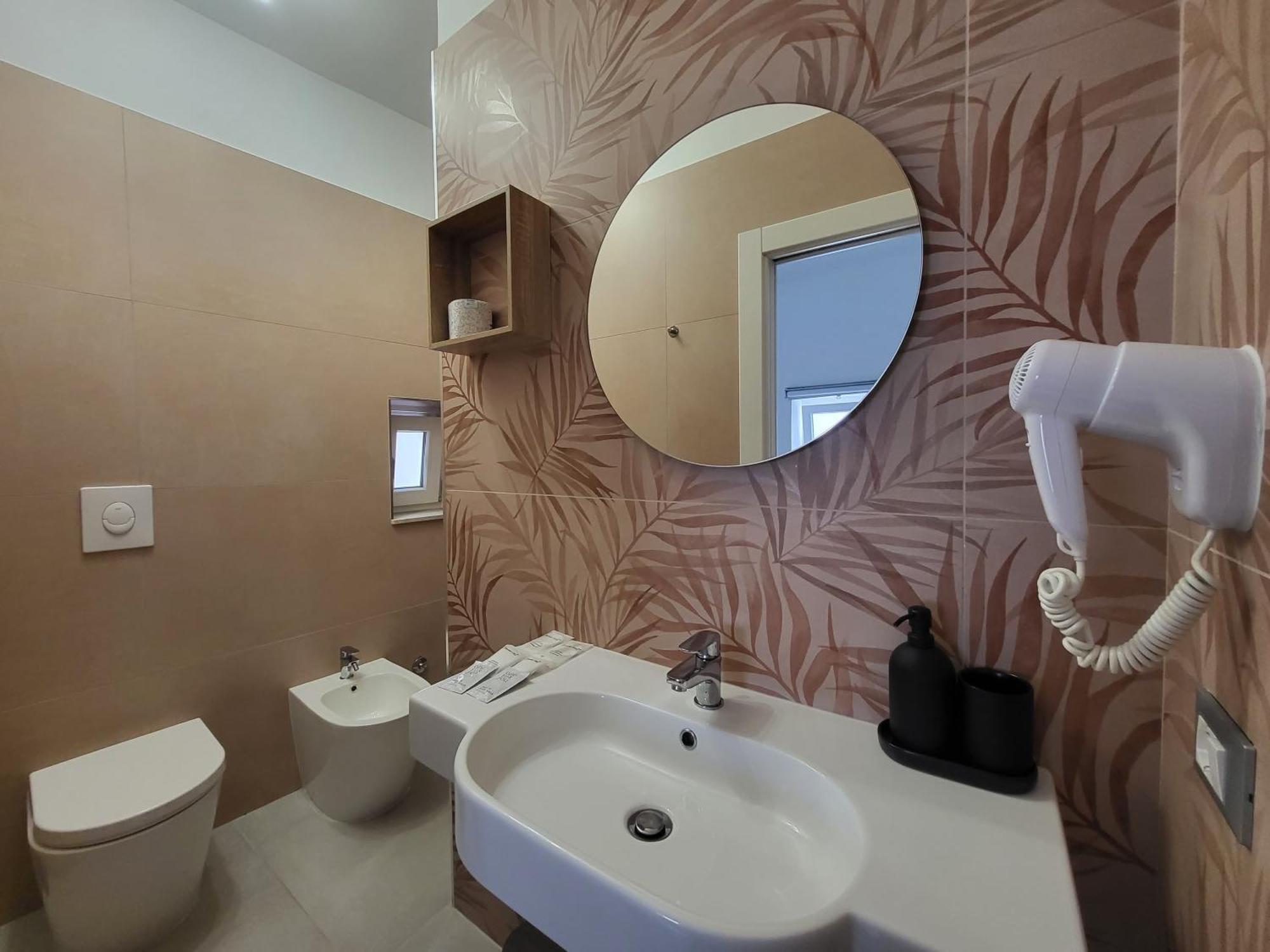 B&B Tra Le Vie Del Borgo Vieste Ruang foto